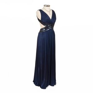 Backless, crisscross navy evening dress with sequin detail.